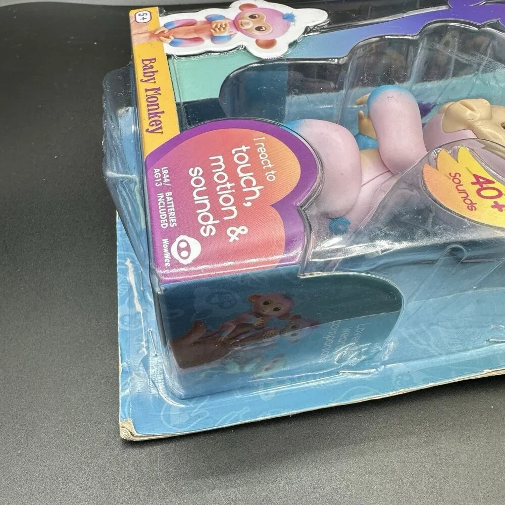 WowWee Fingerlings Baby Monkey Interactive Pet Candi Pink & Blue 40+ Sounds
